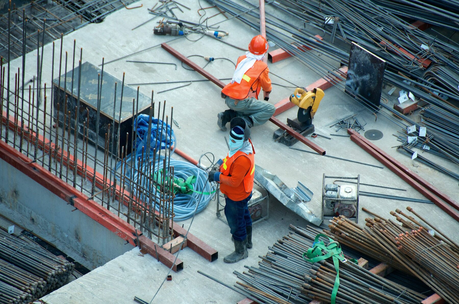 Workers coordinating on an active construction site