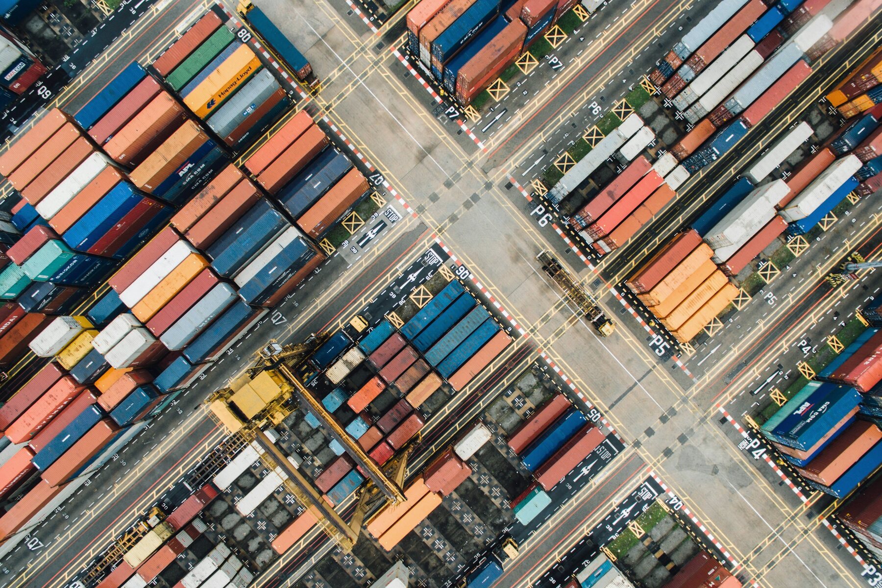 Shipping containers arranged across an intermodal freight yard